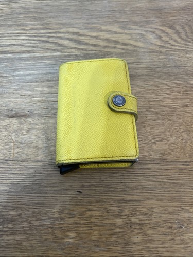 Secrid yellow silver - silver, leather